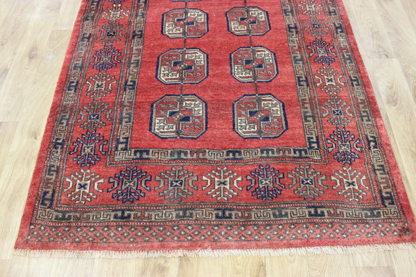 Vintage handmade Turkmen wool rug of traditional large gul design 217 x 126 cm