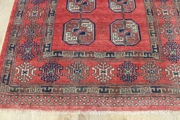 Vintage handmade Turkmen wool rug of traditional large gul design 217 x 126 cm