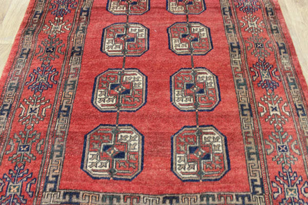 Vintage handmade Turkmen wool rug of traditional large gul design 217 x 126 cm