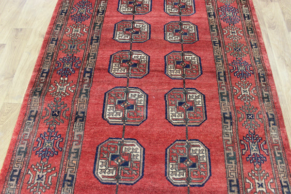 Vintage handmade Turkmen wool rug of traditional large gul design 217 x 126 cm