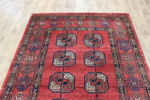 Vintage handmade Turkmen wool rug of traditional large gul design 217 x 126 cm