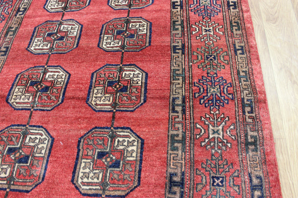 Vintage handmade Turkmen wool rug of traditional large gul design 217 x 126 cm