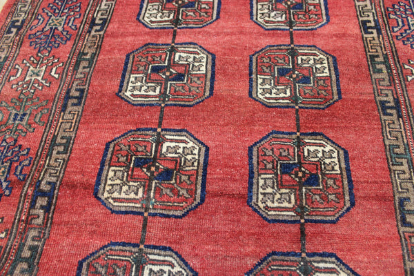Vintage handmade Turkmen wool rug of traditional large gul design 217 x 126 cm