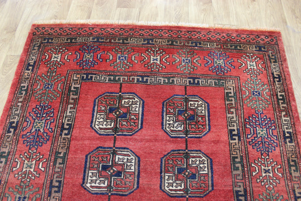 Vintage handmade Turkmen wool rug of traditional large gul design 217 x 126 cm