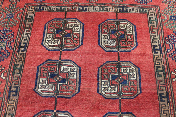 Vintage handmade Turkmen wool rug of traditional large gul design 217 x 126 cm