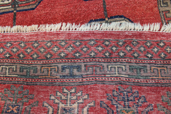 Vintage handmade Turkmen wool rug of traditional large gul design 217 x 126 cm
