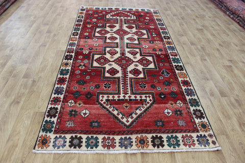Vintage handmade Persian Lori wool rug of traditional large medallion design 288 x 140 cm