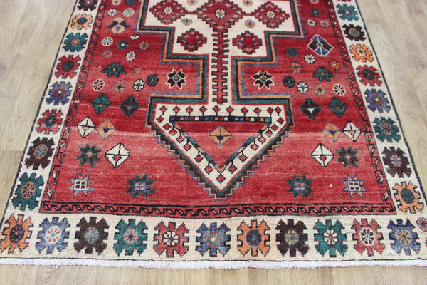 Vintage handmade Persian Lori wool rug of traditional large medallion design 288 x 140 cm