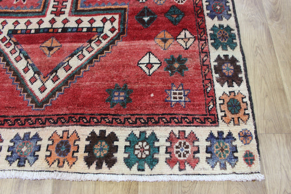 Vintage handmade Persian Lori wool rug of traditional large medallion design 288 x 140 cm