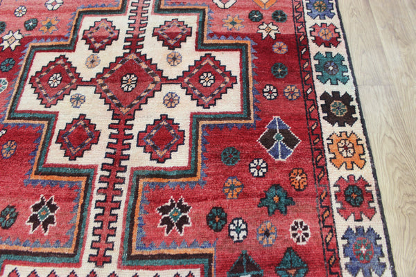 Vintage handmade Persian Lori wool rug of traditional large medallion design 288 x 140 cm