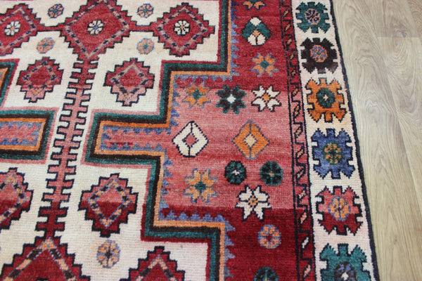 Vintage handmade Persian Lori wool rug of traditional large medallion design 288 x 140 cm