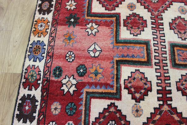 Vintage handmade Persian Lori wool rug of traditional large medallion design 288 x 140 cm