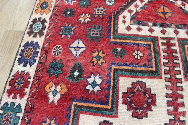Vintage handmade Persian Lori wool rug of traditional large medallion design 288 x 140 cm