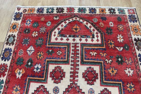 Vintage handmade Persian Lori wool rug of traditional large medallion design 288 x 140 cm