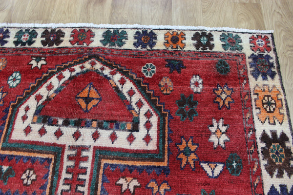 Vintage handmade Persian Lori wool rug of traditional large medallion design 288 x 140 cm