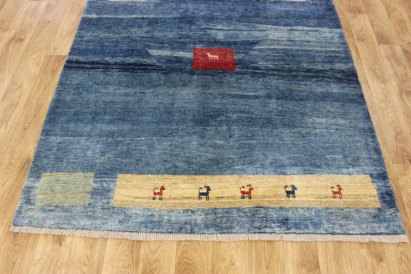 Vintage handmade Persian Gabbeh wool rug with tribal design elements 180 x 145 cm