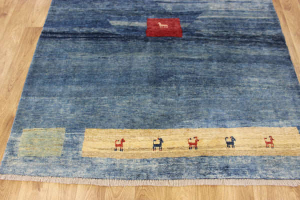 Vintage handmade Persian Gabbeh wool rug with tribal design elements 180 x 145 cm