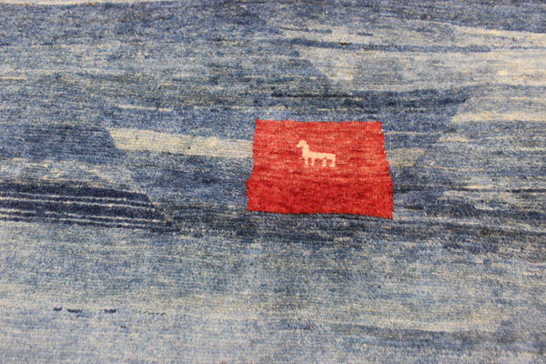 Vintage handmade Persian Gabbeh wool rug with tribal design elements 180 x 145 cm