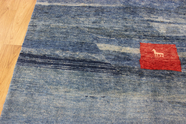 Vintage handmade Persian Gabbeh wool rug with tribal design elements 180 x 145 cm