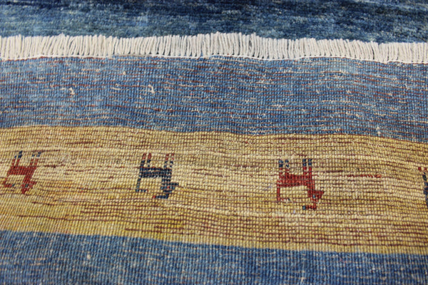 Vintage handmade Persian Gabbeh wool rug with tribal design elements 180 x 145 cm