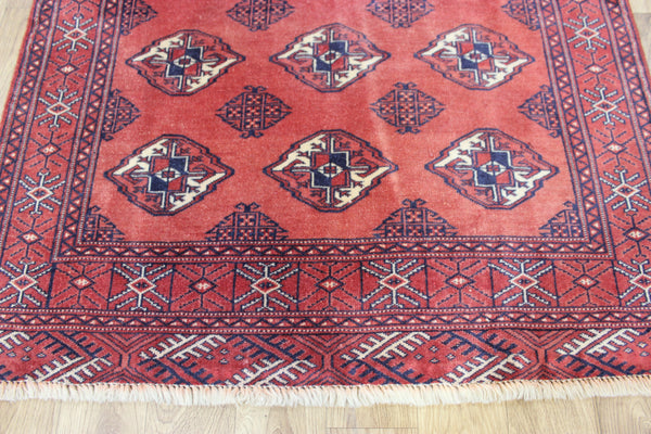 Vintage handmade Bokhara Turkmen wool rug of traditional large gul design 157 x 115 cm