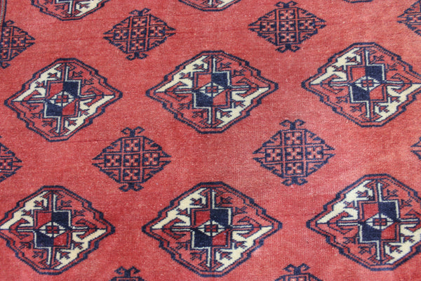 Vintage handmade Bokhara Turkmen wool rug of traditional large gul design 157 x 115 cm