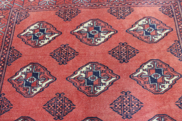 Vintage handmade Bokhara Turkmen wool rug of traditional large gul design 157 x 115 cm