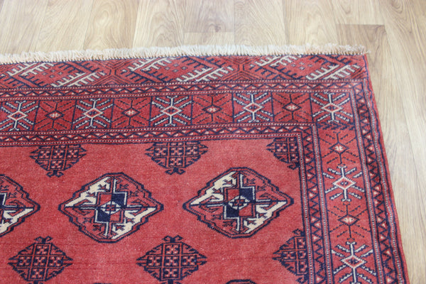 Vintage handmade Bokhara Turkmen wool rug of traditional large gul design 157 x 115 cm