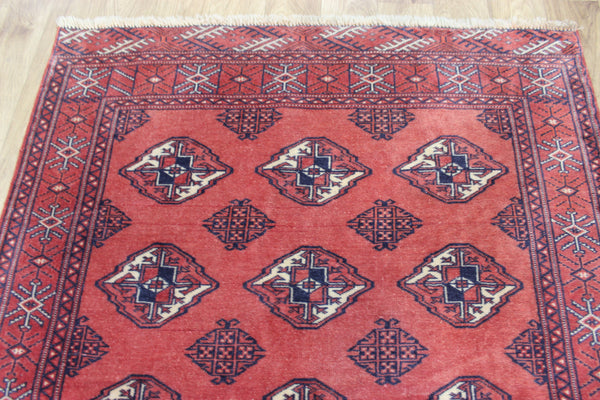 Vintage handmade Bokhara Turkmen wool rug of traditional large gul design 157 x 115 cm