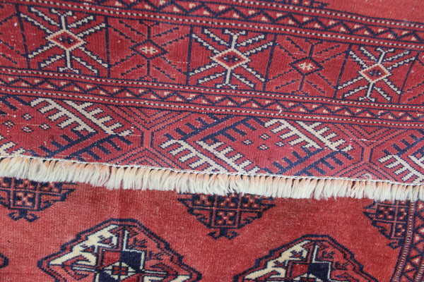 Vintage handmade Bokhara Turkmen wool rug of traditional large gul design 157 x 115 cm