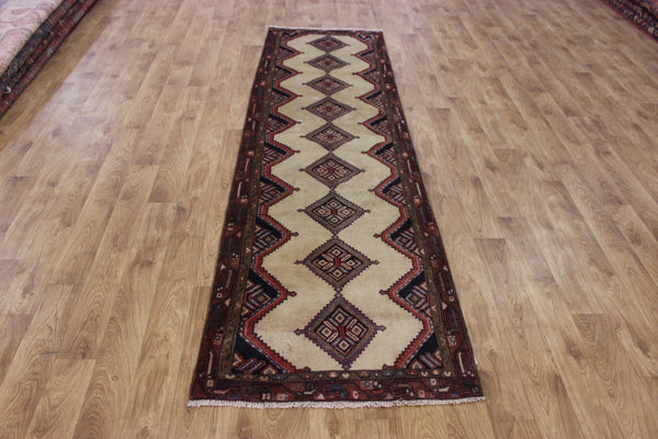 An outstanding handmade Persian runner of traditional medallion design 270 x 70 cm