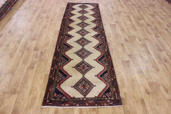 An outstanding handmade Persian runner of traditional medallion design 270 x 70 cm