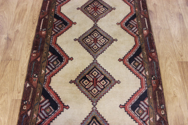 An outstanding handmade Persian runner of traditional medallion design 270 x 70 cm