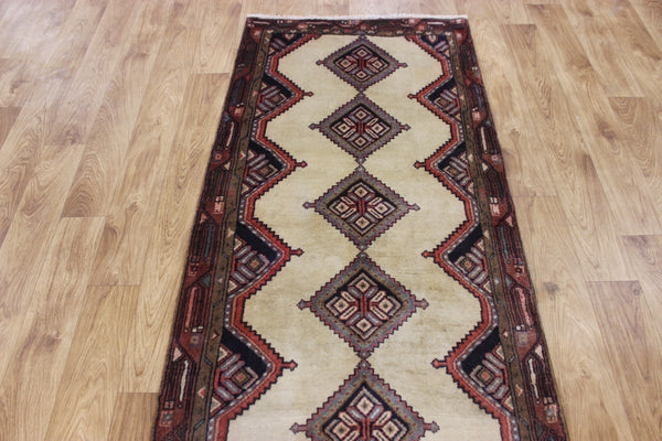 An outstanding handmade Persian runner of traditional medallion design 270 x 70 cm