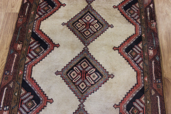 An outstanding handmade Persian runner of traditional medallion design 270 x 70 cm