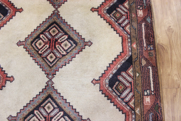 An outstanding handmade Persian runner of traditional medallion design 270 x 70 cm