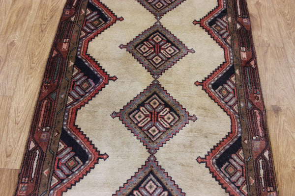 An outstanding handmade Persian runner of traditional medallion design 270 x 70 cm