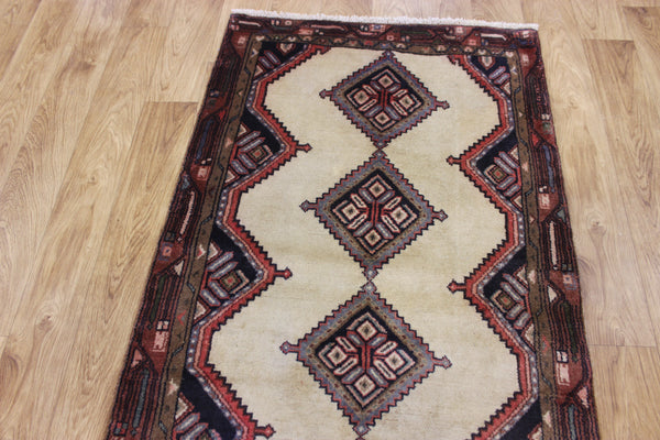 An outstanding handmade Persian runner of traditional medallion design 270 x 70 cm
