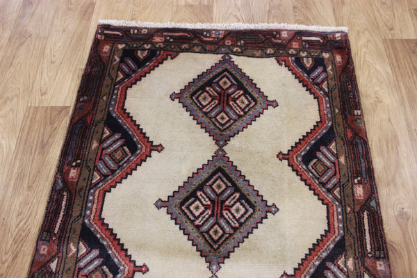 An outstanding handmade Persian runner of traditional medallion design 270 x 70 cm
