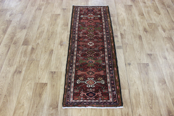 A good Persian Heriz runner of traditional design 140 x 50 cm