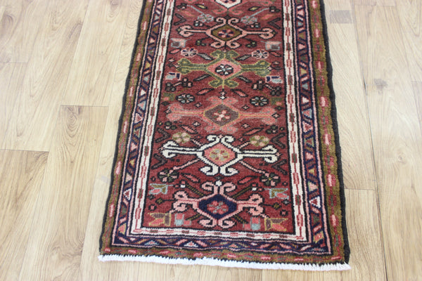 A good Persian Heriz runner of traditional design 140 x 50 cm