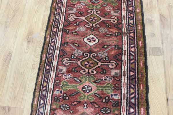 A good Persian Heriz runner of traditional design 140 x 50 cm