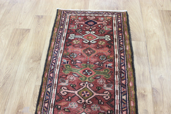 A good Persian Heriz runner of traditional design 140 x 50 cm
