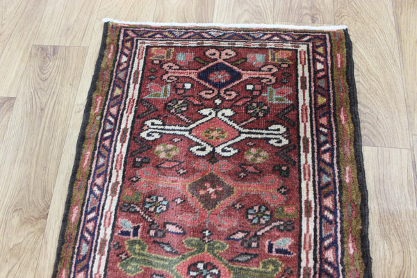 A good Persian Heriz runner of traditional design 140 x 50 cm