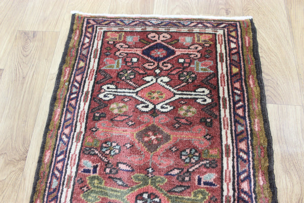 A good Persian Heriz runner of traditional design 140 x 50 cm
