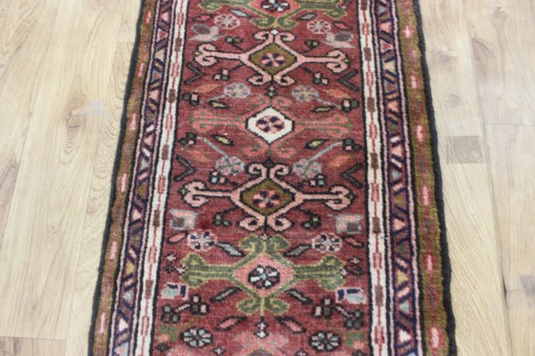 A good Persian Heriz runner of traditional design 140 x 50 cm