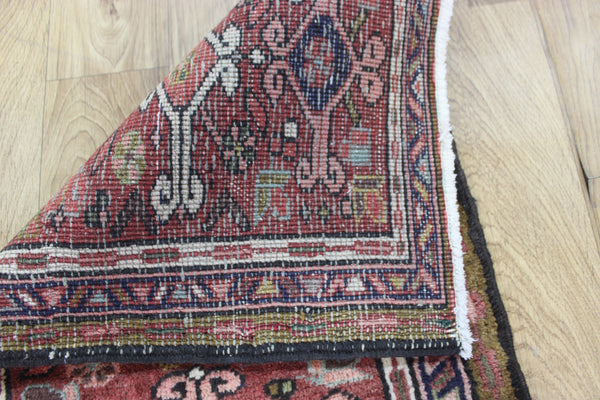 A good Persian Heriz runner of traditional design 140 x 50 cm