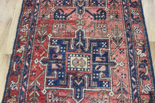 A good Persian runner with a design unique to the town of Heriz 284 X 86 CM