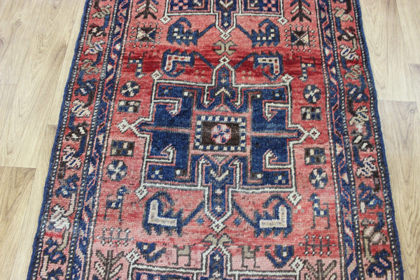 A good Persian runner with a design unique to the town of Heriz 284 X 86 CM