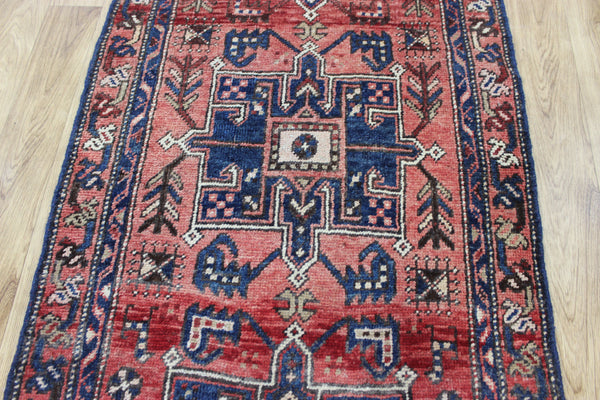 A good Persian runner with a design unique to the town of Heriz 284 X 86 CM